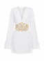 White dress with a statement belt and embroidery