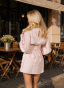Soft pink dress with an accent belt and embroidery