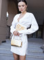 White dress with a statement belt and embroidery